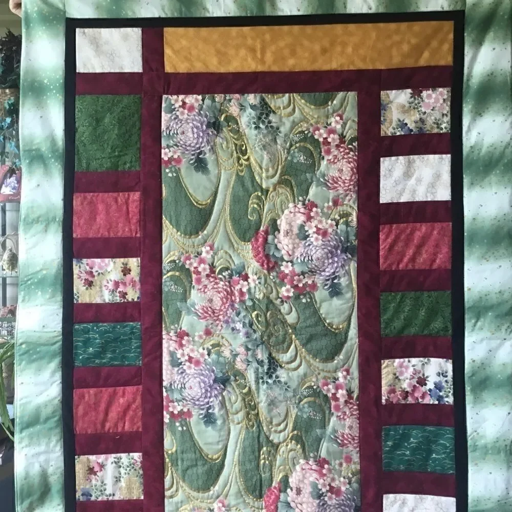Handmade Lap Quilt. 43” x 63”